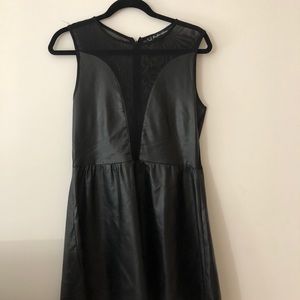A black mesh and leather dress